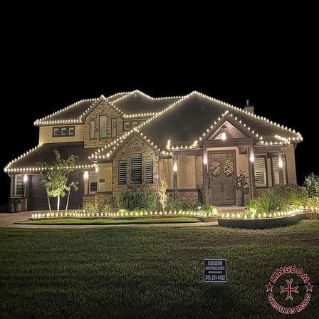 Professional Christmas light installation on a home in Tomball, Texas